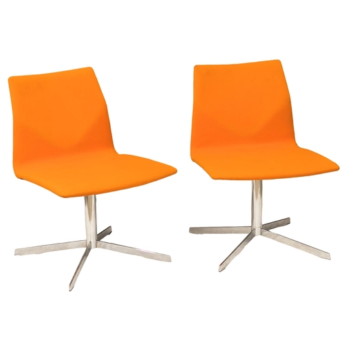 226 - A pair of Danish swivel chairs by Four Design. 3