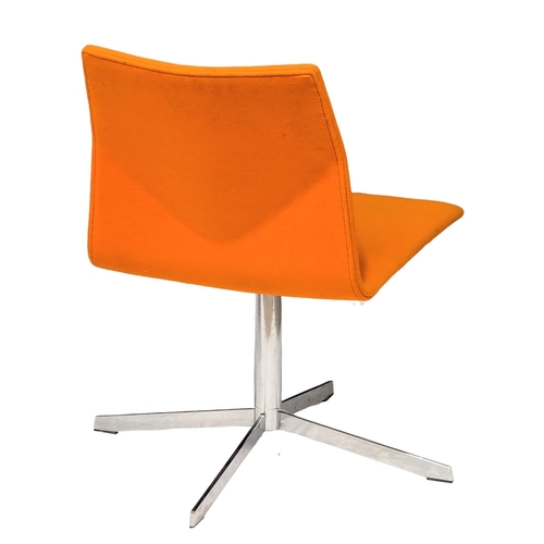 226 - A pair of Danish swivel chairs by Four Design. 3