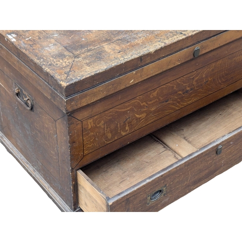 259 - A 19th Century pine kist with fitted interior, exterior drawer and original scumble paint. 104x55.5x... 