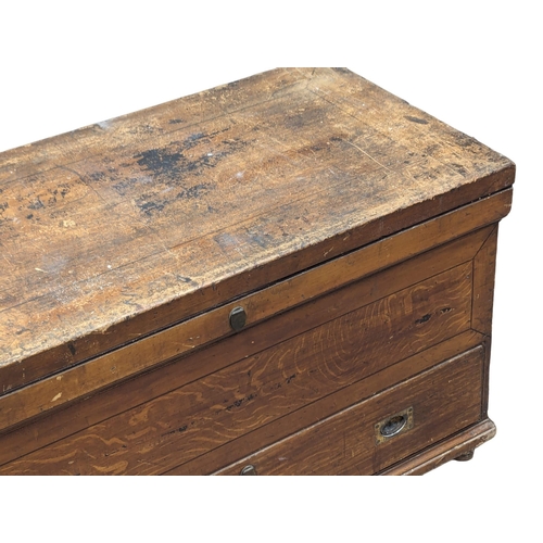 259 - A 19th Century pine kist with fitted interior, exterior drawer and original scumble paint. 104x55.5x... 