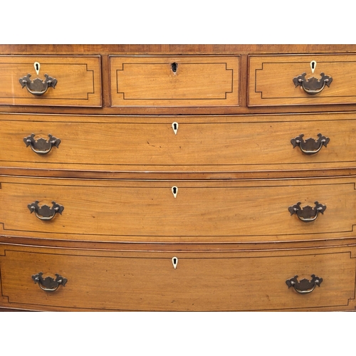 273 - A George III inlaid mahogany bow front chest of drawers on splayed bracket feet. 118x60x104.5cm (5)