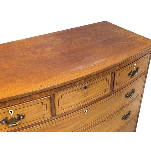 273 - A George III inlaid mahogany bow front chest of drawers on splayed bracket feet. 118x60x104.5cm (5)