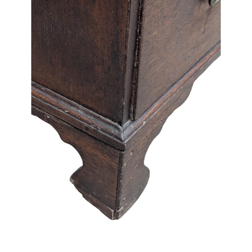 279 - A Late 18th Century George III oak chest of drawers with original handles on bracket feet. Circa 178... 