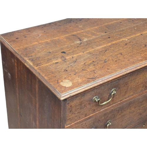 279 - A Late 18th Century George III oak chest of drawers with original handles on bracket feet. Circa 178... 