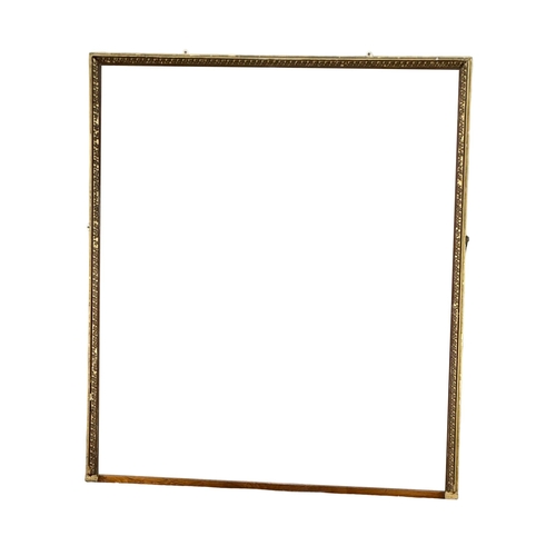 335 - A very large 19th Century Victorian gilt framed over-mantle mirror. 147x170cm