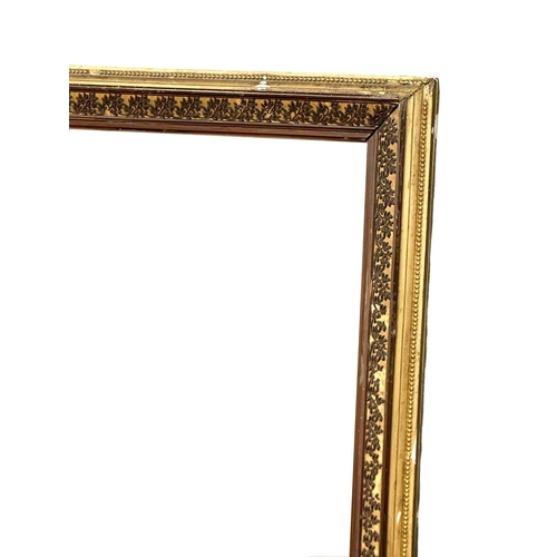 335 - A very large 19th Century Victorian gilt framed over-mantle mirror. 147x170cm