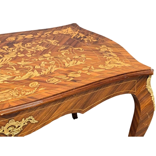 370 - A large Louis XV style inlaid dining table with brass ormolu mounts. 161x99x81.5cm. 6