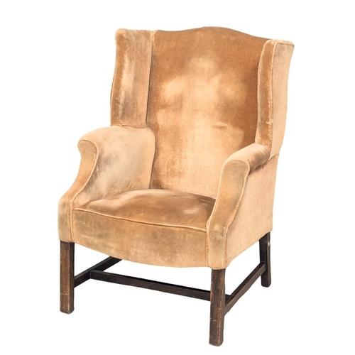 376 - An Early 20th century Georgian style wingback armchair. 9