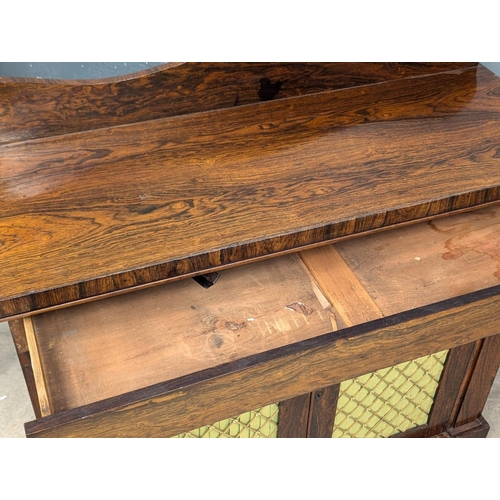 410 - A Late George IV rosewood chiffonier with brass mesh doors and drawer. Circa 1820-1830. 112x44x108.5... 