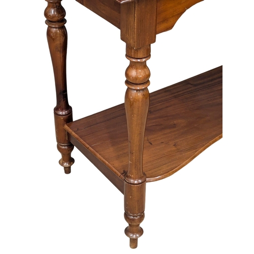 420 - A 19th Century Victorian mahogany side table with gallery back on turned legs. 103x48x95.5cm (8)