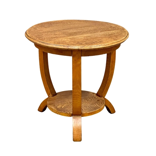 421 - A 1930’s Art Deco oak 2 tier occasional table/end table. 52x50cm (5)