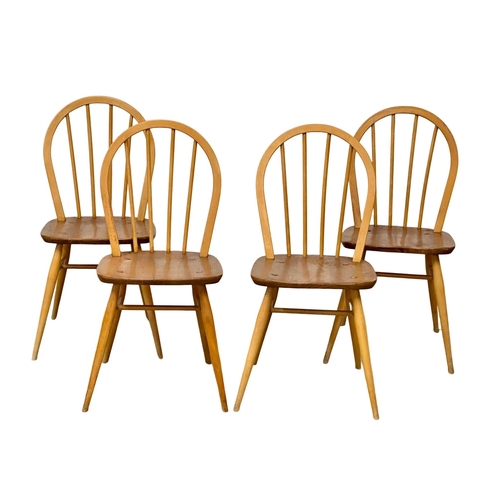 46 - A set of 4 Ercol Mid Century elm and beech dinner chairs. Model 400. 1