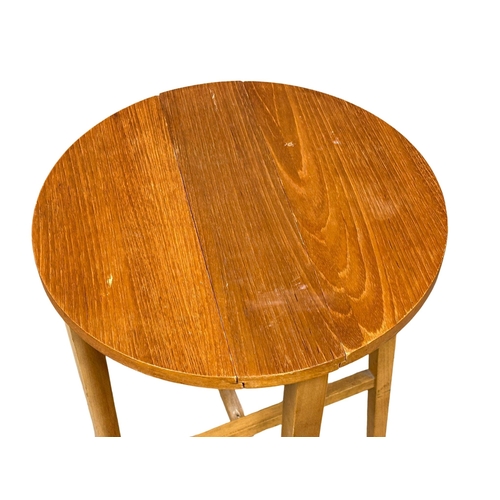 503 - A Danish Mid century teak nest of tables designed by Poul Hundevad. Circa 1960. (1)