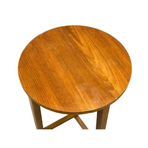 503 - A Danish Mid century teak nest of tables designed by Poul Hundevad. Circa 1960. (1)