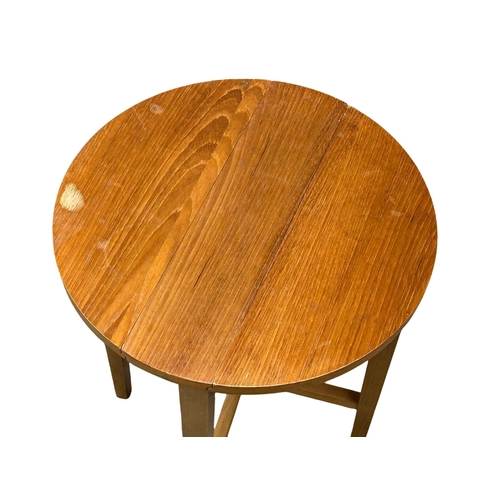 503 - A Danish Mid century teak nest of tables designed by Poul Hundevad. Circa 1960. (1)