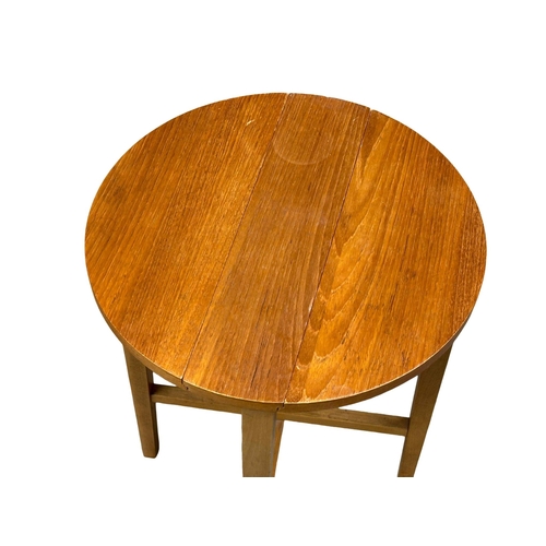 503 - A Danish Mid century teak nest of tables designed by Poul Hundevad. Circa 1960. (1)