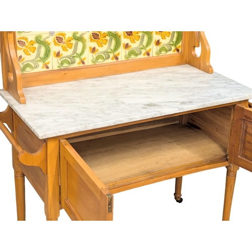 504 - A Late 19th Century Victorian satin walnut marble top washstand with Art Nouveau tiles. Circa 1880/1... 