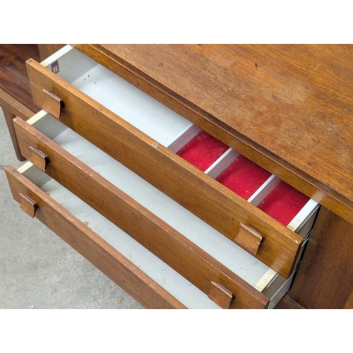 521A - A Mid Century teak sideboard by Elliots of Newbury. 172.5x44x72.5cm. 7