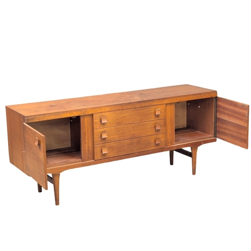 521A - A Mid Century teak sideboard by Elliots of Newbury. 172.5x44x72.5cm. 7