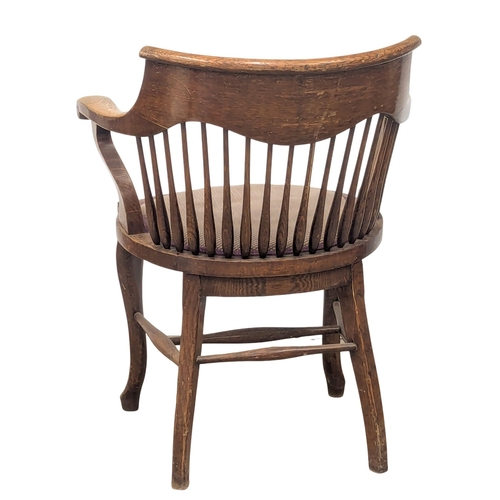 522 - An Early 20th Century oak office chair. Circa 1920. 1