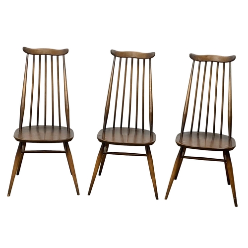 531 - A set of 3 Ercol Mid Century elm and beech “Goldsmith” dining chairs. (1)