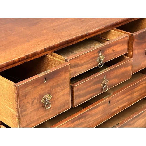 540 - An Early 19th Century Regency mahogany, oak lined chest of drawers, on splayed bracket feet. Circa 1... 