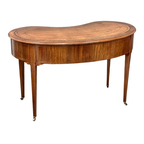 541 - A Late 19th Century Sheraton Revival inlaid mahogany kidney shaped writing desk, with leather top. C... 