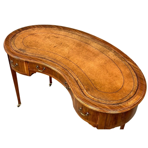 541 - A Late 19th Century Sheraton Revival inlaid mahogany kidney shaped writing desk, with leather top. C... 