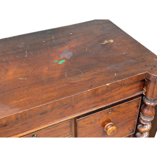 543 - A large Victorian mahogany chest of drawers with twist columns. No base. 125x61x111cm