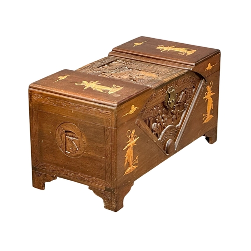 545 - A 1930’s Chinese camphorwood trunk. 94x45x48cm (1)