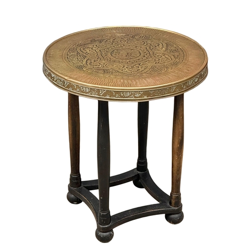 548 - An Early 20th Century Chinese brass top table. 60x67.5cm. (1)