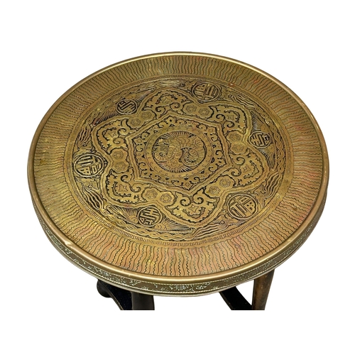 548 - An Early 20th Century Chinese brass top table. 60x67.5cm. (1)