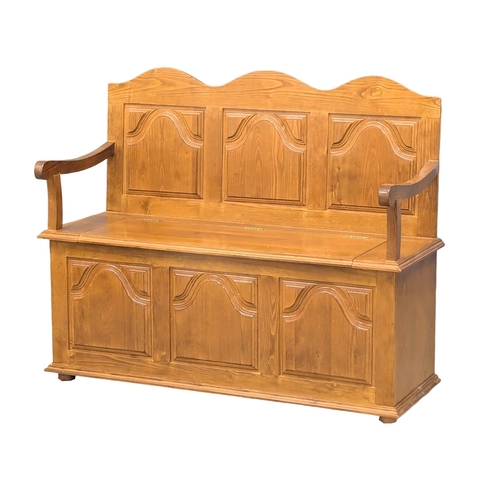 562 - An ash monks bench. 119x41x97cm (3)