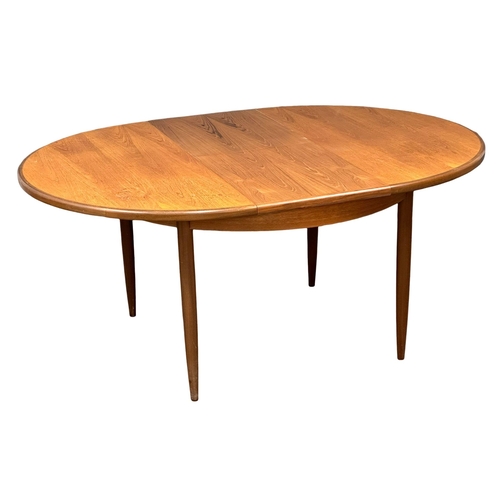 57 - A G-Plan “Fresco” Mid Century teak extending dining table and 4 chairs. Designed by Victor Wilkins. ... 