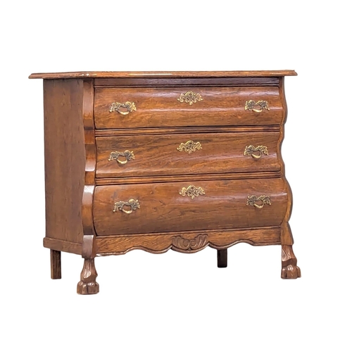 575 - A North European 18th Century style oak chest of drawers. 74x40x64cm (11)