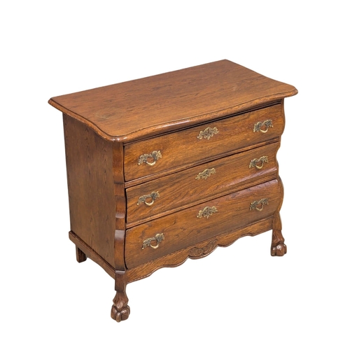 575 - A North European 18th Century style oak chest of drawers. 74x40x64cm (11)