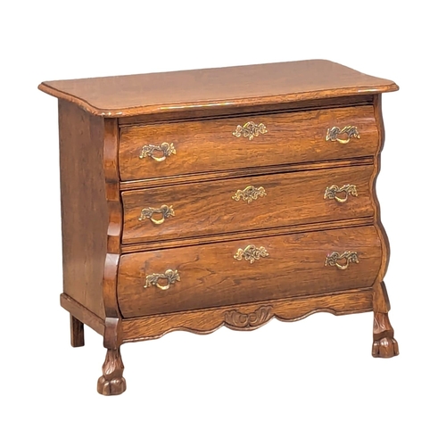 575 - A North European 18th Century style oak chest of drawers. 74x40x64cm (11)