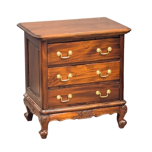 593 - A 19th Century style mahogany chest of drawers with brass drop handles on Cabriole legs. 67x44x69cm ... 