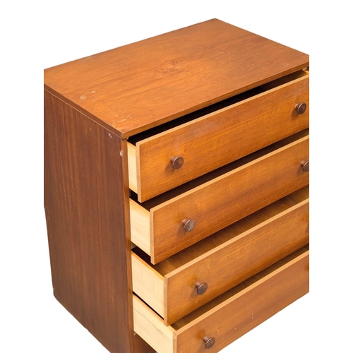 594 - A Mid Century teak chest of drawers. 68x42.5x79cm. 11