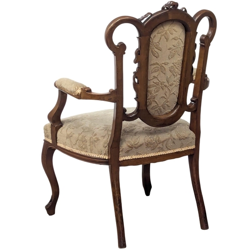 595 - A pair of Edward VII mahogany open armchairs. Edwardian. Circa 1901-1910. (2)