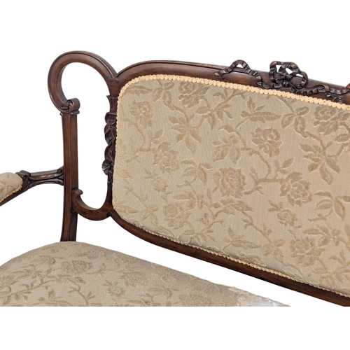 595A - An Edward VII mahogany sofa. Edwardian, Circa 1901-1910. 130cm. 8