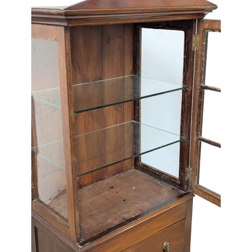 641 - An Early 20th Century mahogany display cabinet with 2 drawers. 60x36x158cm. 5