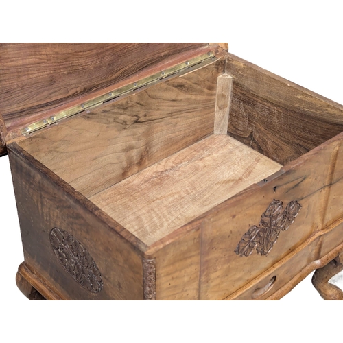 645 - A vintage carved olive wood sewing box. 47x33x38cm. 10