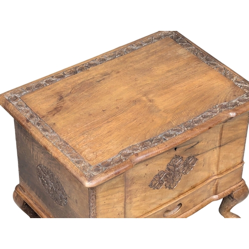 645 - A vintage carved olive wood sewing box. 47x33x38cm. 10