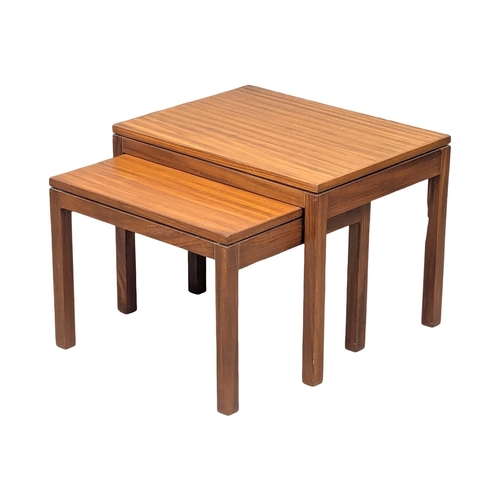 652 - A Mid Century teak nest of tables. 2