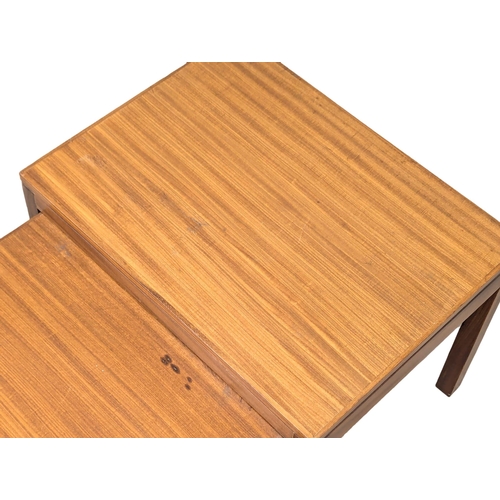 652 - A Mid Century teak nest of tables. 2