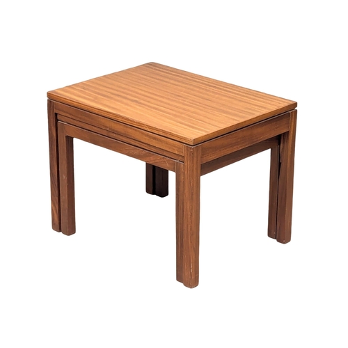 652 - A Mid Century teak nest of tables. 2