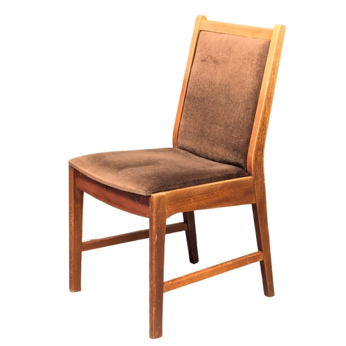 658 - A set of 6 Mid Century teak dining chairs. (2)