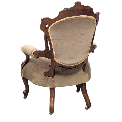 661 - An 19th Century Victorian walnut open armchair on Cabriole legs. 2