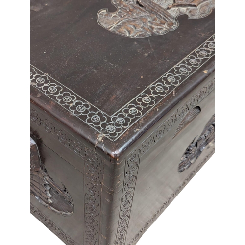 673 - A 1930s Chinese camphorwood trunk. 96x47x45cm. 11